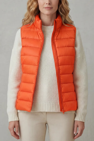 Women's puffer jacket style lightweight layering winter vest in Orange