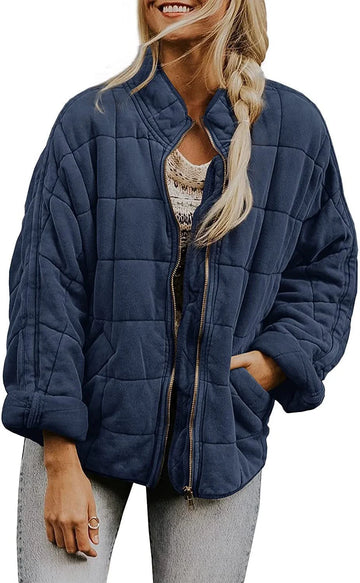 Women's quilted winter bomber jacket with stand collar and zip front in Blue