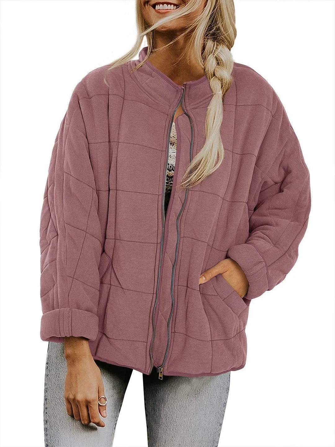 Women's quilted winter bomber jacket with stand collar and zip front in Lotus Pink