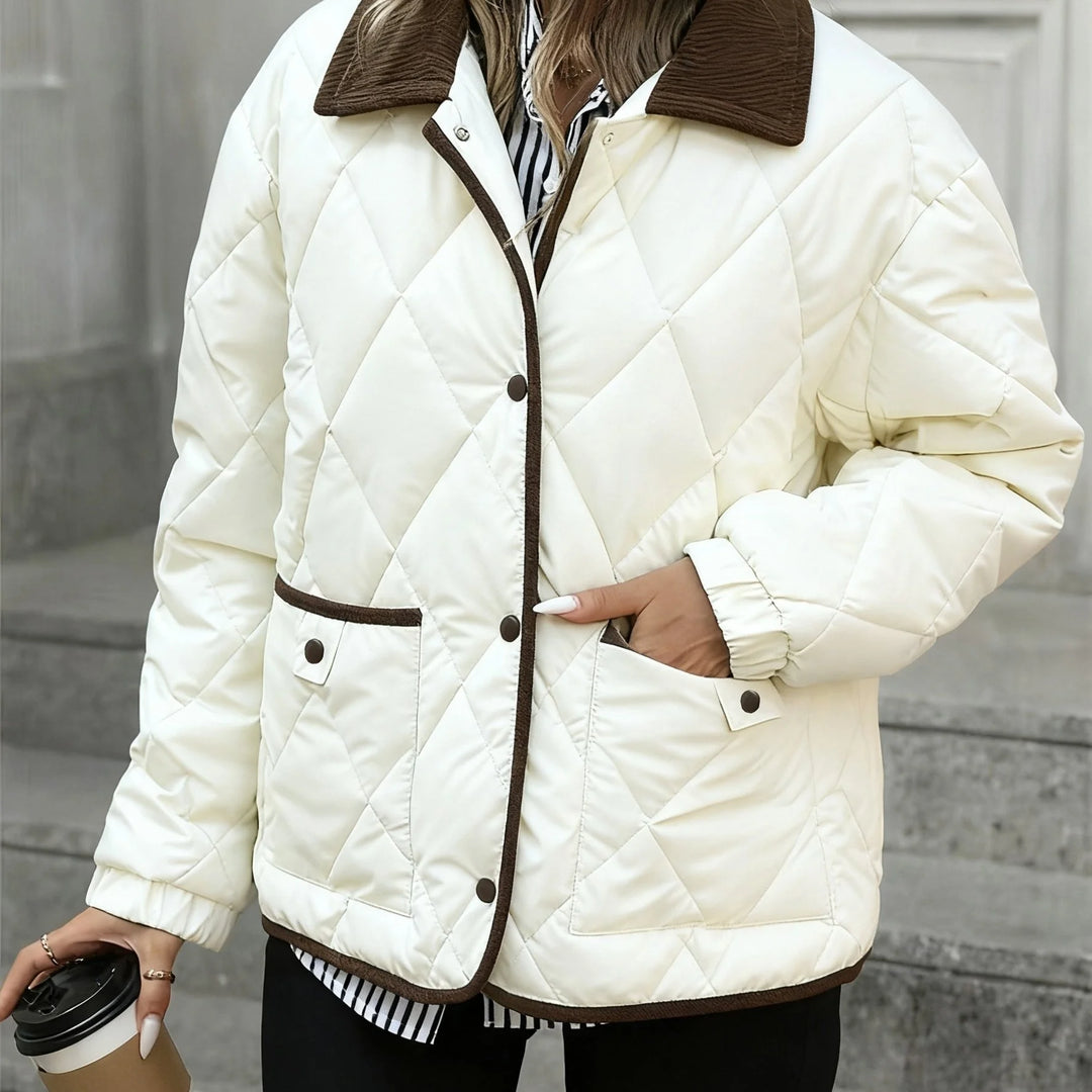 Women's quilted winter puffer jacket with snap button closure in White
