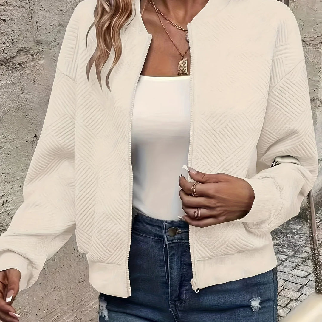 Women's quilted zip-up winter bomber jacket with full zip closure in Apricot