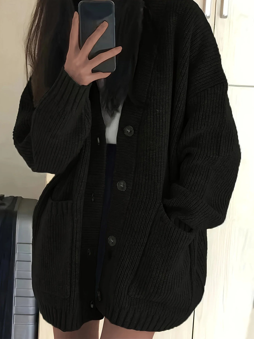 Women's relaxed button-front winter cardigan with pockets in Black