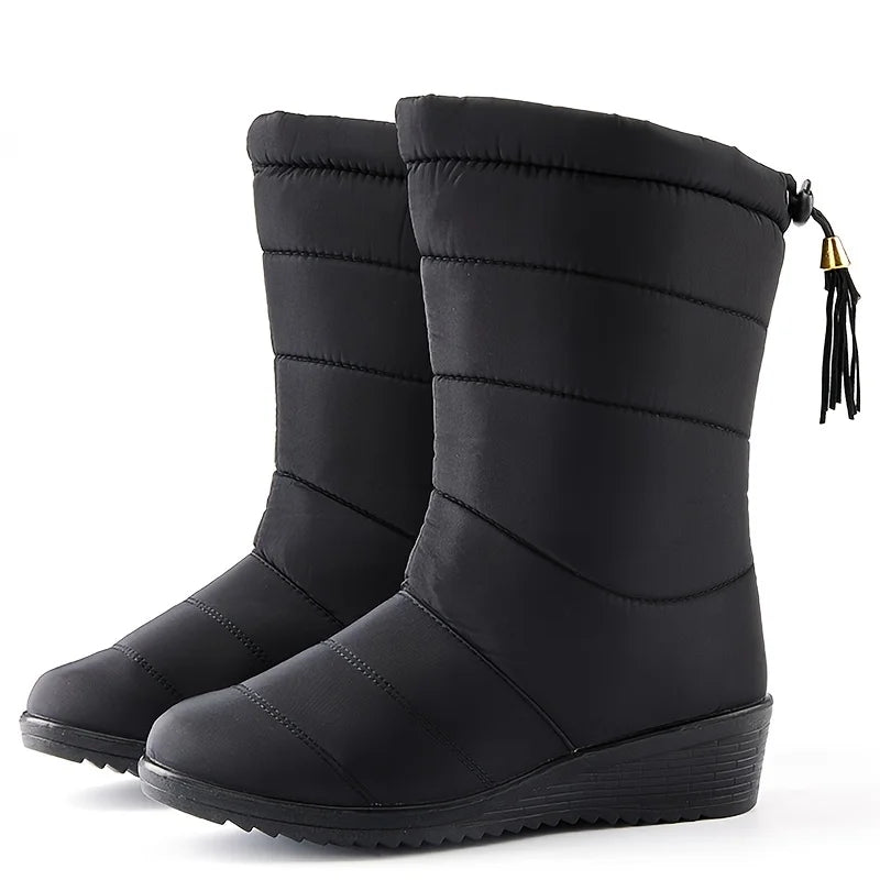 Women's quilted mid-calf winter snow boots with faux fur lining in Black