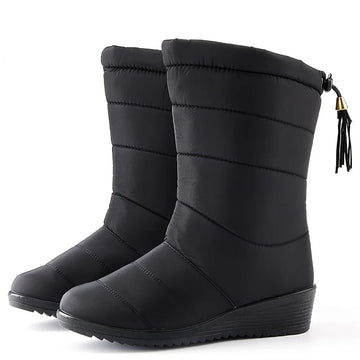 Women's quilted mid-calf winter snow boots with faux fur lining in Black