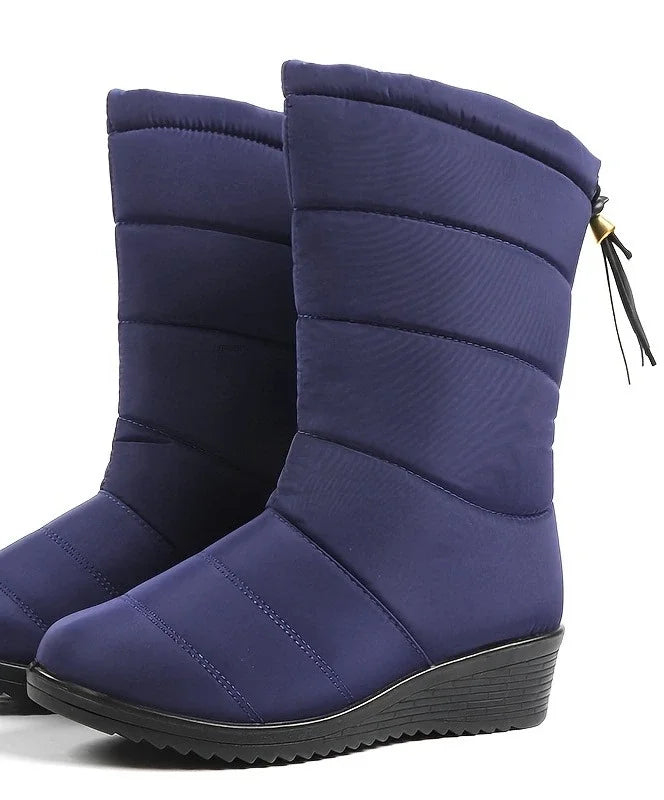 Women's quilted mid-calf winter snow boots with faux fur lining in Navy Blue