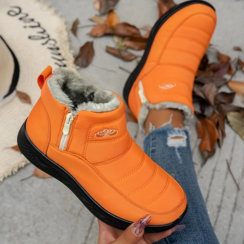 Women's ankle winter snow boots with quilted upper in Orange